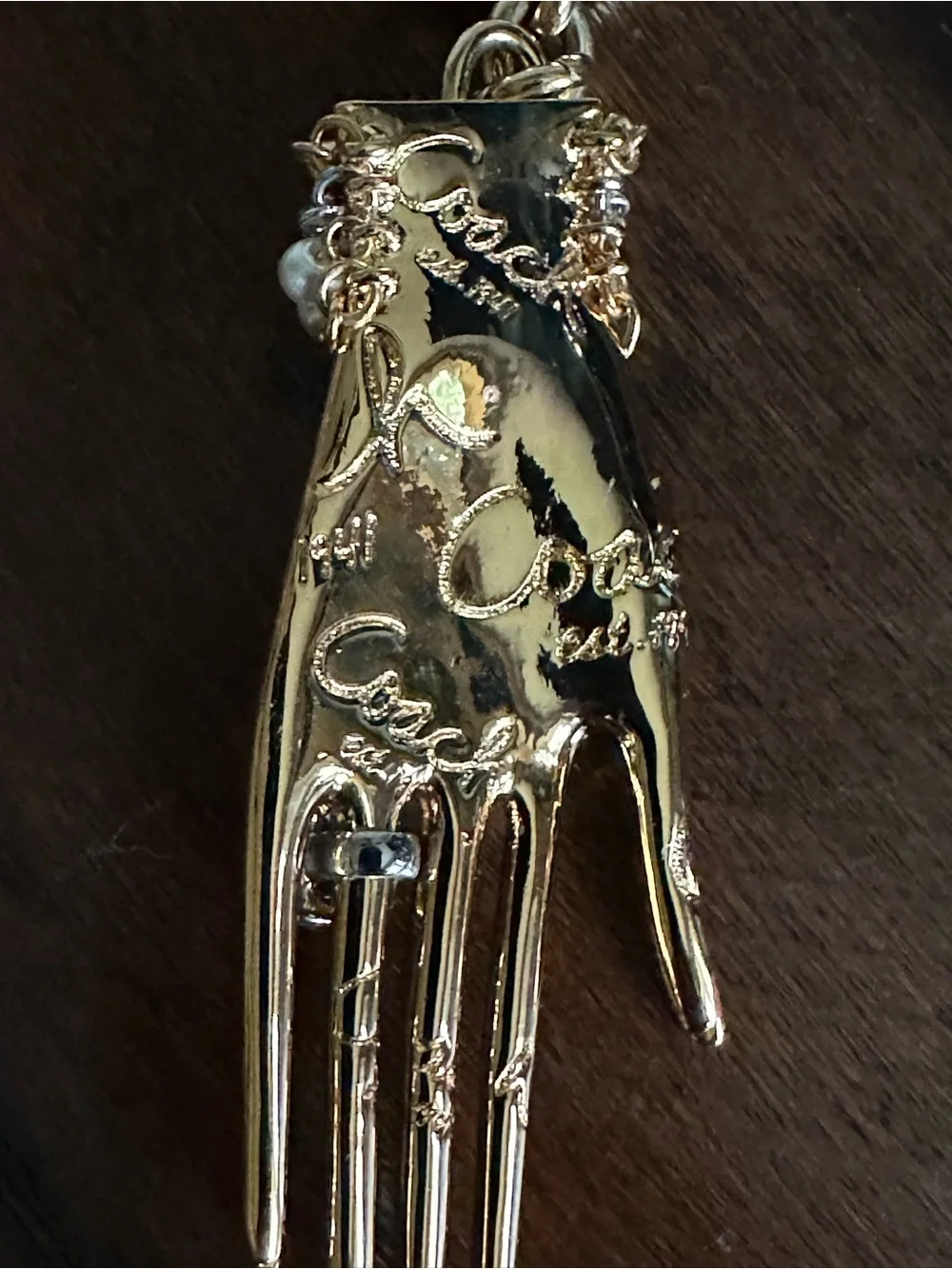 Coach unique gold